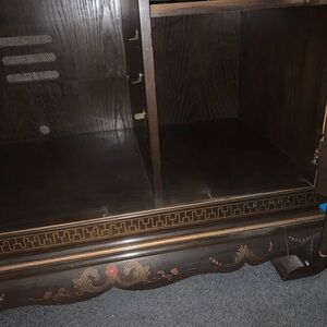 Vintage Wooden Cabinet with Floral Detailing